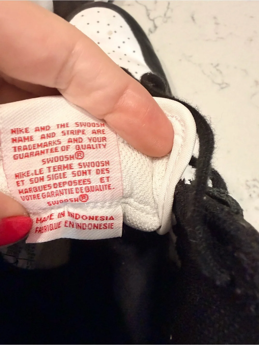 Nike Kids Black and White High-Top Sneakers with Red Logo